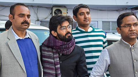 Sharjeel Imam is being taken to court, at Chanakyapuri in New Delhi, in this file image dated Jan. 29, 2020