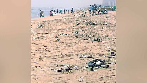 Waste scattered on the sands of Marina Beach on Sunday