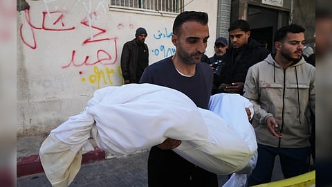 The body of 11-year-old Palestinian girl Hamsa Hosou, killed by Israeli fire in Jabalia, is brought to Shifa Hospital in Gaza City.