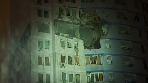 A residential building is damaged after a Russian air strike during a heavy snow storm in Kyiv, Ukraine