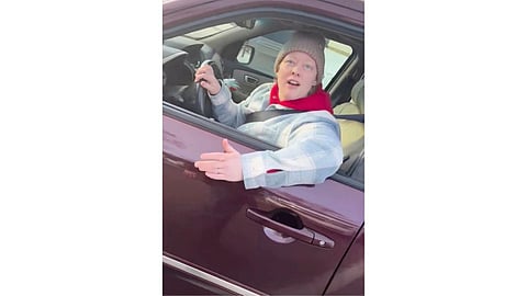 This image from video made by Immigration and Customs Enforcement officer Jonathan Ross via Alpha News shows Renee Good in her vehicle in Minneapolis.