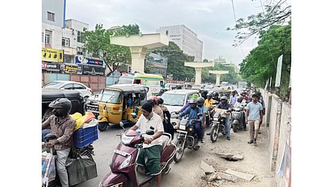 Pedestrians and two wheelers struggles to commute