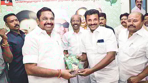AIADMK general secretary Edappadi Palaniswami with a ticket aspirant from Virudhunagar district