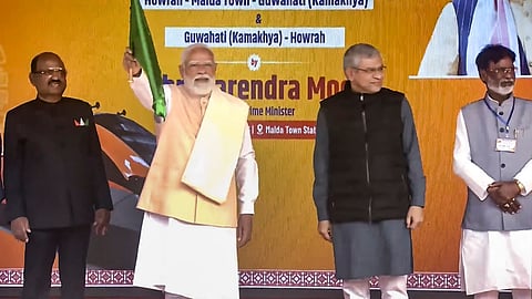 Prime Minister Narendra Modi flags off India's first Vande Bharat sleeper train between Howrah and Guwahati, in Malda, West Bengal. West Bengal Governor CV Ananda Bose and Union Railways Minister Ashwini Vaishnav are also seen.