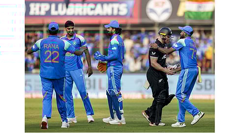 New Zealand's Glenn Phillips being greeted by India's Mohammed Siraj as he walks off the field after his dismissal during the third ODI cricket match between India and New Zealand, at Holkar Cricket Stadium, in Indore, Madhya Pradesh, Sunday, Jan. 18, 2026.