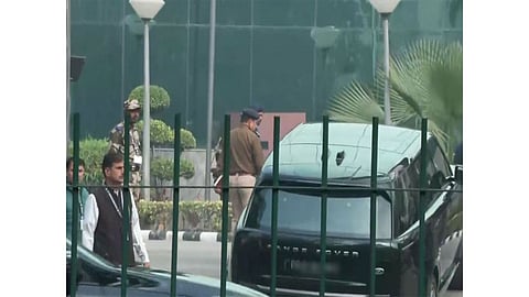 TVK chief Vijay inside the car arriving at the CBI office in Delhi.