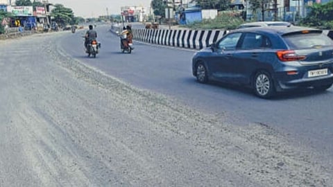 Debris and sand has made Wallajabad-Oragadam Road slippery
