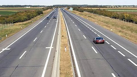 Image of a four-lane road used for representative purpose