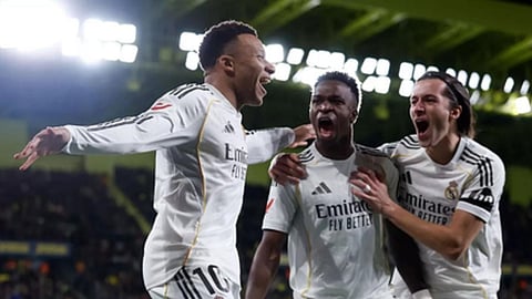 Kylian Mbappe celebrating with his team mates