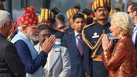 Prime Minister Narendra Modi receives chief guest President of the European Commission Ursula von der Leyen during the 77th Republic Day Parade, in New Delhi. President Droupadi Murmu is also seen