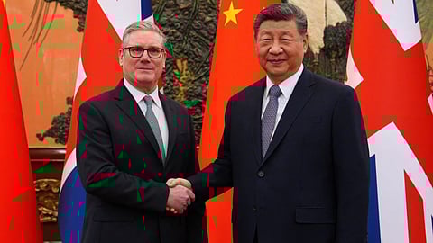 Britain’s Prime Minister Keir Starmer, left, shakes hands with Chinese President Xi Jinping ahead of a bilateral meeting in Beijing, China, Thursday, Jan.29, 2026.