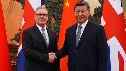 Britain’s Prime Minister Keir Starmer, left, shakes hands with Chinese President Xi Jinping ahead of a bilateral meeting in Beijing, China.