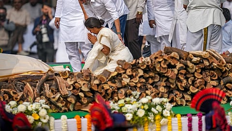 NCP-SP leader Supriya Sule pays her respects to the mortal remains of Maharashtra Deputy Chief Minister Ajit Pawar during his funeral, at Baramati in Pune district, Thursday, Jan. 29, 2026
