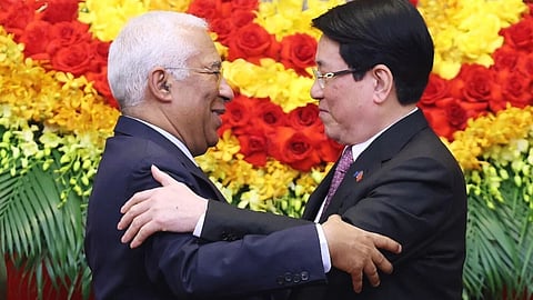 European Council President Antonio Costa, left, and Vietnamese President Luong Cuong hug after a press conference in Hanoi, Vietnam, Thursday, Jan. 29, 2026.
