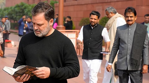 Leader of Opposition in the Lok Sabha Rahul Gandhi with Lok Sabha MPs who were suspended on Tuesday for the remainder of the Budget session for "unruly behaviour'', as they stage a protest with a poster 'PM is compromised', at Parliament premises in New Delhi, Wednesday, Feb. 4, 2026