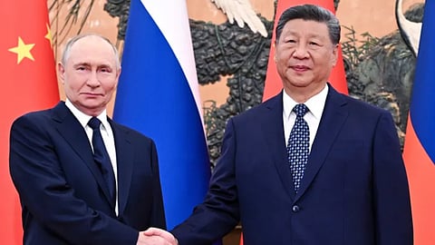 (L-R) Vladimir Putin and Xi Jinping