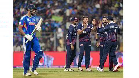 USA's players celebrate the dismissal of India's Shivam Dube during the ICC Men's T20 World Cup 2026 cricket match between India and USA, at the Wankhede Stadium, in Mumbai, Saturday, Feb. 7, 2026