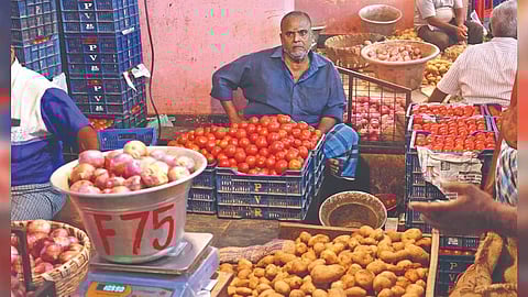 Image of a man selling vegetables used for representative purpose