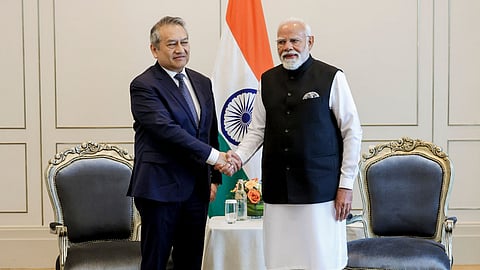 Prime Minister Narendra Modi, right, meets Khazanah Nasional Berhad Managing Director Amirul Feisal Wan Zahir, in Malaysia.