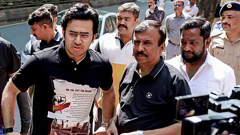 BJP MP Tejasvi Surya arrives to interact with commuters at RV Road Metro Station over concerns regarding the proposed Bengaluru Metro fare revision, in Bengaluru