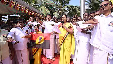DMDK general secretary Premalatha Vijayakant administering an oath to cadre on the party's 26th annual flag day event at headquarters in Koyambedu on Thursday