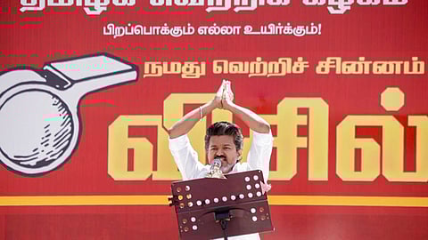 TVK chief Vijay addresses party functionaries during a meeting in Salem