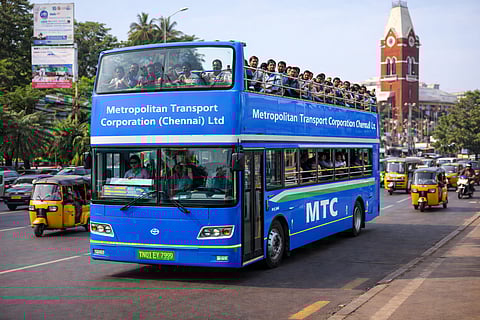 AI-generated image of an open-roof electric double-decker