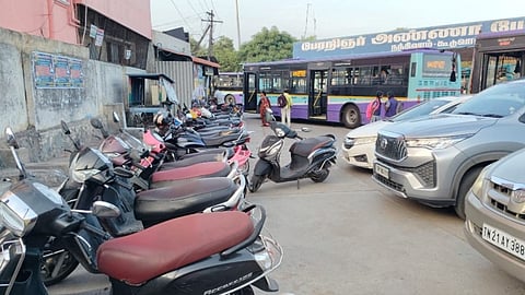Buses navigate through the Nandivaram-Guduvancheri bus terminus as vehicles take over space