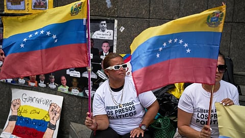 People who consider their detained family members to be political prisoners protest for their releases outside the United Nations office in Caracas, Venezuela.
