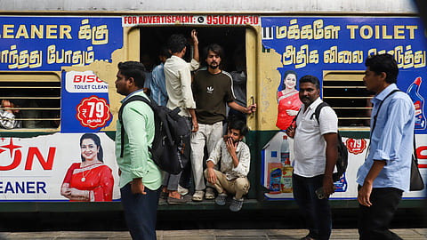 Passengers wait at Egmore station after suburban services were disrupted due to a signal failure