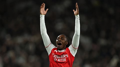 Arsenal's Eberechi Eze celebrates scoring his side's third goal during the English Premier League soccer match between Tottenham Hotspur and Arsenal in London