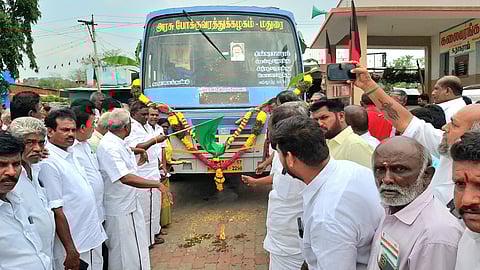 Villagers in Varusanadu welcome the bus by breaking coconuts and showering flowers