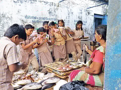 Students clicking pictures as part of the initiative