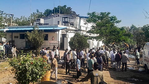 Debris and damaged structures seen after a blast at an explosives manufacturing factory, in Nagpur district