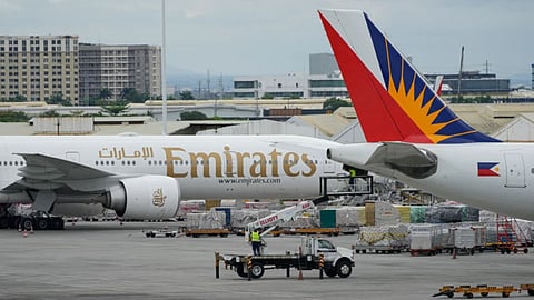 Emirates plane at Manila's International Airport, Philippines.
