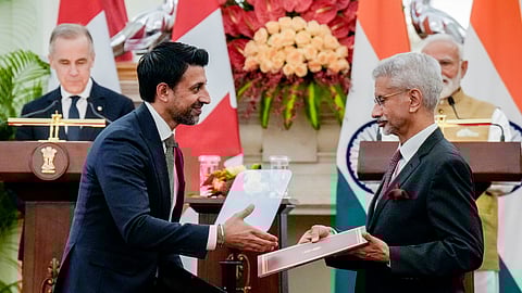 Prime Minister Narendra Modi and Canadian Prime Minister Mark Carney witness an MoU exchange between External Affairs Minister S Jaishankar and Canada Minister of International Trade Maninder Sidhu during a joint press meet, at Hyderabad House in New Delhi, Monday, March 2, 2026