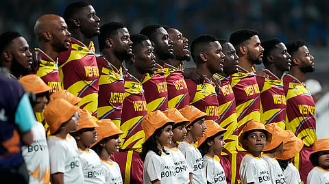 West Indies' players stand up for the national anthems before the start of the T20 World Cup cricket match between India and West Indies in Kolkata, India, Sunday, March 1, 2026