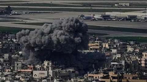 Smoke rises following an Israeli airstrike in Dahiyeh. Beirut's southern suburb, near Rafik Hariri International Airport