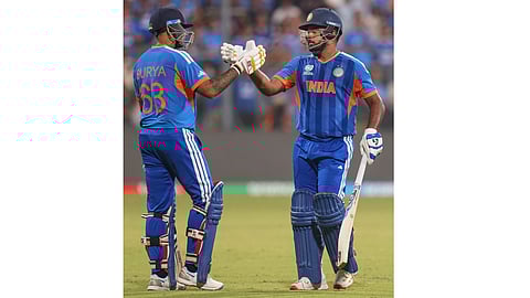 India's Sanju Samson, right, greets captain Suryakumar Yadav as he returns to the pavilion after the former's dismissal by England's Will Jacks during the ICC Men's T20 World Cup 2026 second semifinal cricket match between India and England, at the Wankhede Stadium, in Mumbai, Maharashtra, Thursday, March 5, 2026