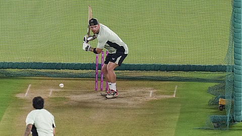 New Zealand's Glenn Phillips, back, plays a shot during a practice session ahead of the ICC Men's T20 World Cup 2026 final cricket match between India and New Zealand, at the Narendra Modi Stadium, in Ahmedabad.