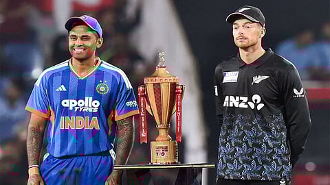 Indian captain Suryakumar Yadav (L) with New Zealand skipper Mitchell Santner (R).