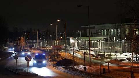 Norwegian police attend outside the U.S. Embassy in Oslo, Norway in the early hours of Sunday, March 8, 2026