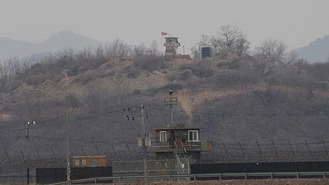 A North Korean military guard post, top, and a South Korean post, bottom, are seen from Paju, South Korea, near the border with North Korea, Thursday, Feb. 26, 2026.
