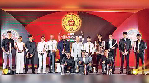 The MRF MMSC FMSCI National four-wheeler and two-wheeler champions along with MRF Vice-Chairman and Managing Director Arun Mammen (7th from left)