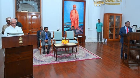 Governor Rajendra Vishwanath Arlekar administering the oath to State Information Commissioner A Vijayaram at Lok Bhavan on Friday