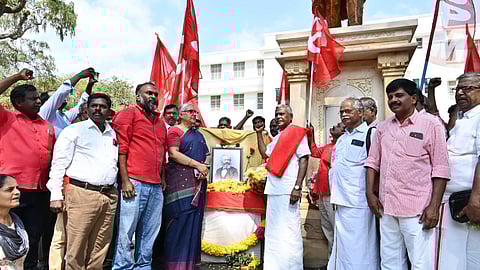 CPM state secretary P Shanmugam and other leaders after paying floral tributes to the Karl Marx statue at Connemara Library campus in Chennai on Saturday