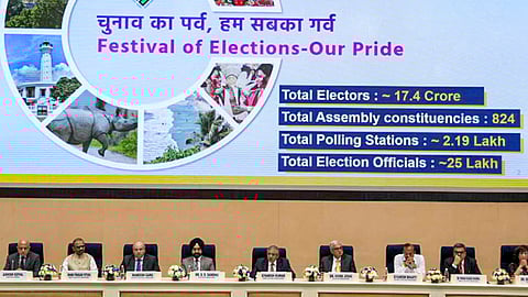Chief Election Commissioner Gyanesh Kumar, centre, with Election Commissioners S S Sandhu and Vivek Joshi during a press conference, at Vigyan Bhawan in New Delhi, Sunday, March 15, 2026