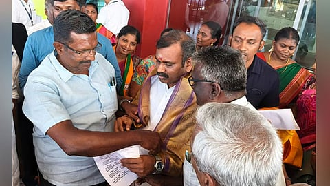 Union Minister of State L Murugan at the Thoothukudi Airport on Saturday