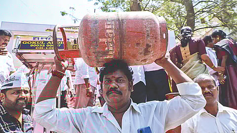 Members of DMK-led SPA protested with empty LPG cylinders, and also demanded the Centre to release pending funds