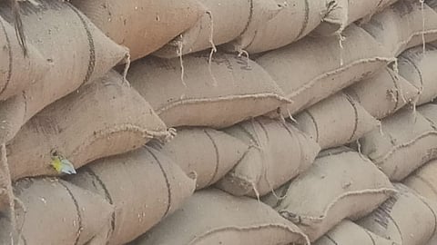 Stocks of paddy pile up at a DPC in Tiruvaiyaru in Thanjavur on Thursday